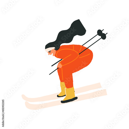 Cute skier woman in the red jumpsuit skiing during winter vacation. Enjoying outdoor winter pastime, active sports.