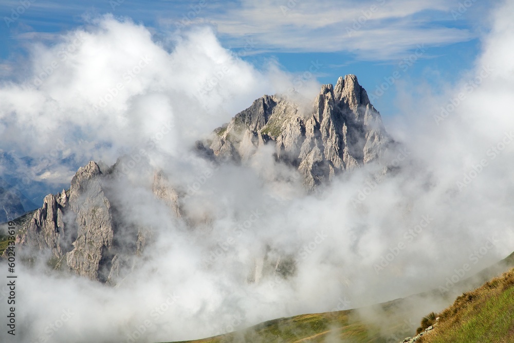 Dolomites mountains in the middle of Clouds