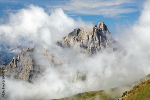 Dolomites mountains in the middle of Clouds