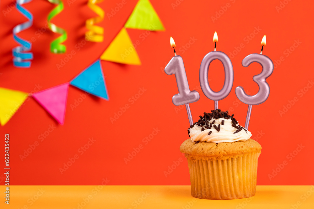 Birthday cake with number 103 candle - Sparkling orange background with bunting