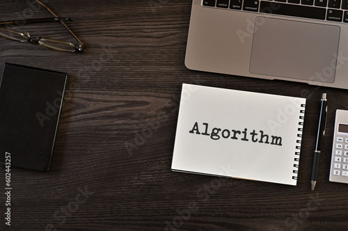 There is notebook with the word Algorithm.It is as an eye-catching image.