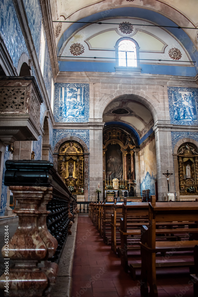 Perspective of blurred balustrade inside Santiago Church decorated with tile panels and gilded carvin, Alcácer do Sal - PORTUGAL