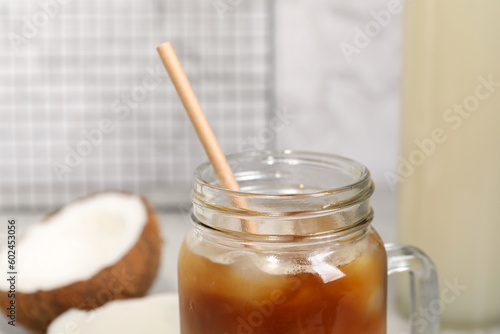 Mason jar of delicious iced coffee, closeup