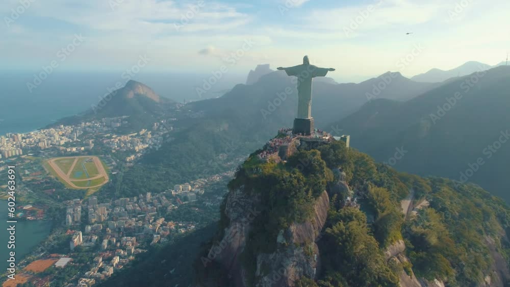 custom made wallpaper toronto digitalRIO DE JANEIRO, BRASIL - MAY, 2023: Drone aerial view of of a famous landmark Christ the Redeemer statue on Corcovado mauntain at sunrise. most visited tourist site in Rio at sunny day from above.