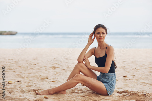 travel woman nature holiday vacation smile beach sea sand freedom sitting