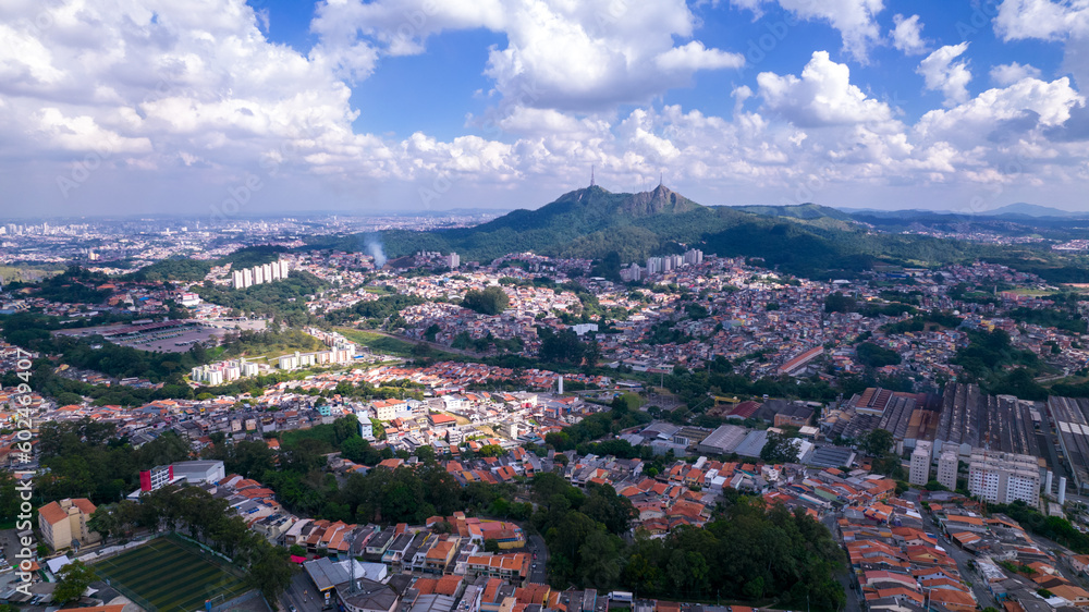 Aerial view of the Pirituba neighborhood in Sao Paulo, Brazil. Pico do Jaraguá in the background.