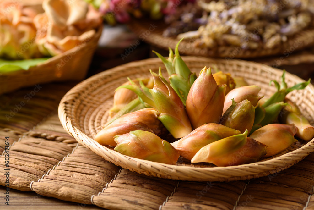 Natural fresh edible flower are an ingredient in local thai cuisine on black background Natural fresh edible flower are an ingredient in local thai cuisine on black background