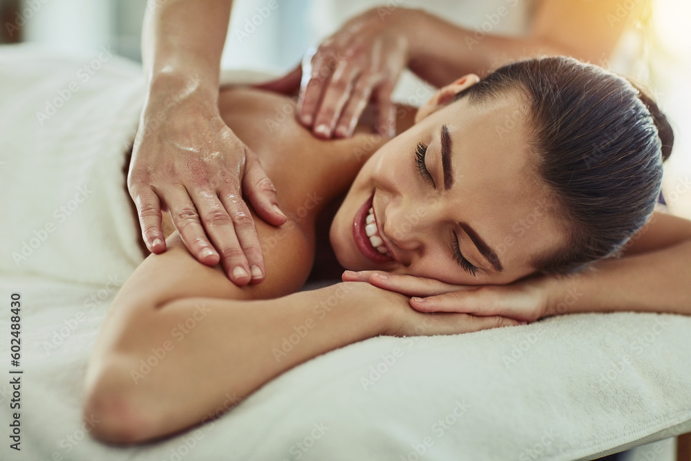 Smile, beauty and massage with woman in spa for wellness, luxury and relax treatment. Skincare, peace and zen with female customer and hands of therapist for physical therapy, salon and detox