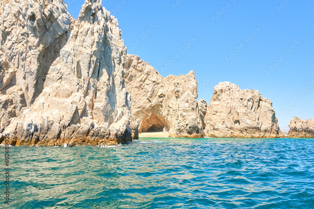 rocky mountains of los cabos, baja california sur, Mexico. Deep blue and emerald green pacific ocean in foreground. love and divorce beach.