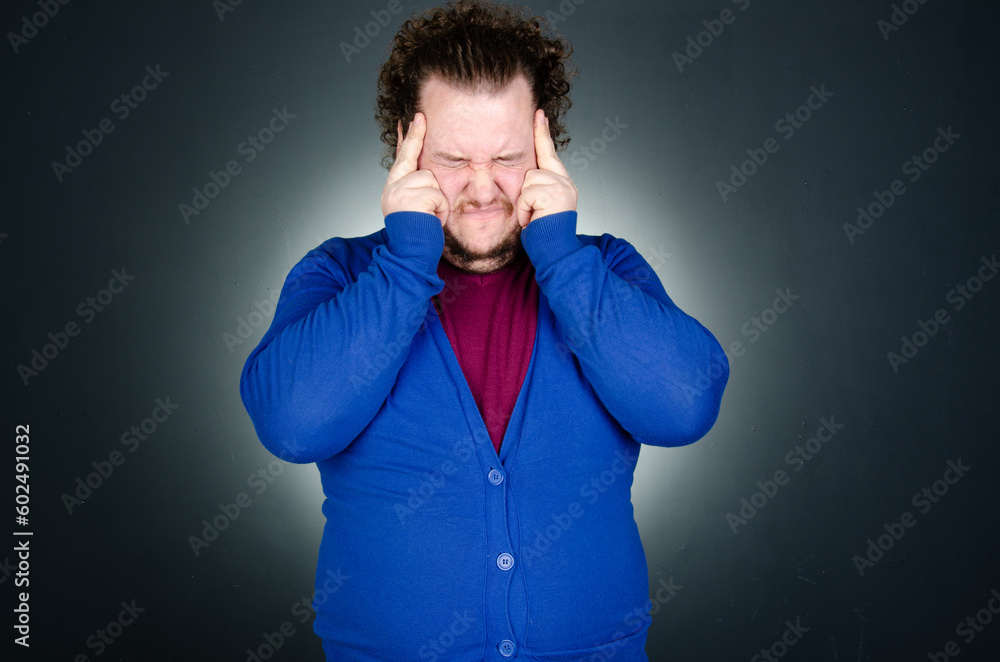 Business and work. Funny fat man posing in the studio.