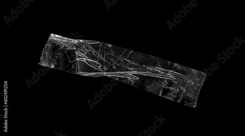 adhesive plastic tape isolated on black background © Piman Khrutmuang