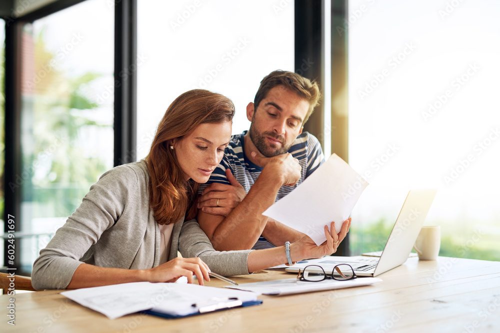 Finance, documents and couple planning budget for tax, bills and savings on laptop with banking, online payment and investment. People, paperwork and conversation on household financial strategy - obrazy, fototapety, plakaty 