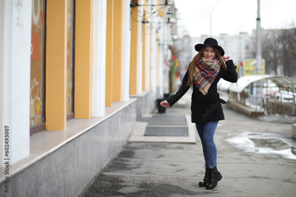 French woman for a walk in early spring