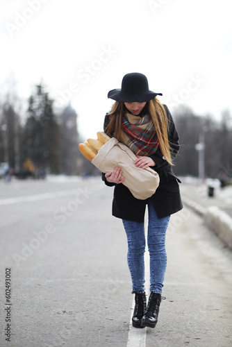 French woman with baguettes in the bag © alexkich