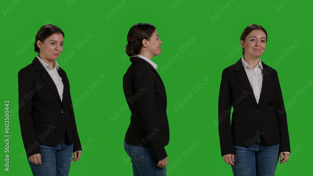 Close up of female manager wearing office suit in studio, acting stylish and confident on camera. Businesswoman with corporate job standing over isolated greenscreen background. Close up of female manager wearing office suit in studio, acting stylish and confident on camera. Businesswoman with corporate job standing over isolated greenscreen background.
