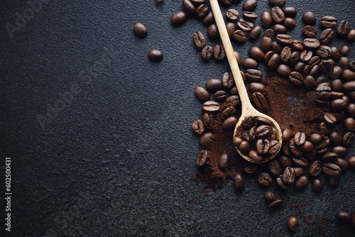 Coffee beans on wooden old background