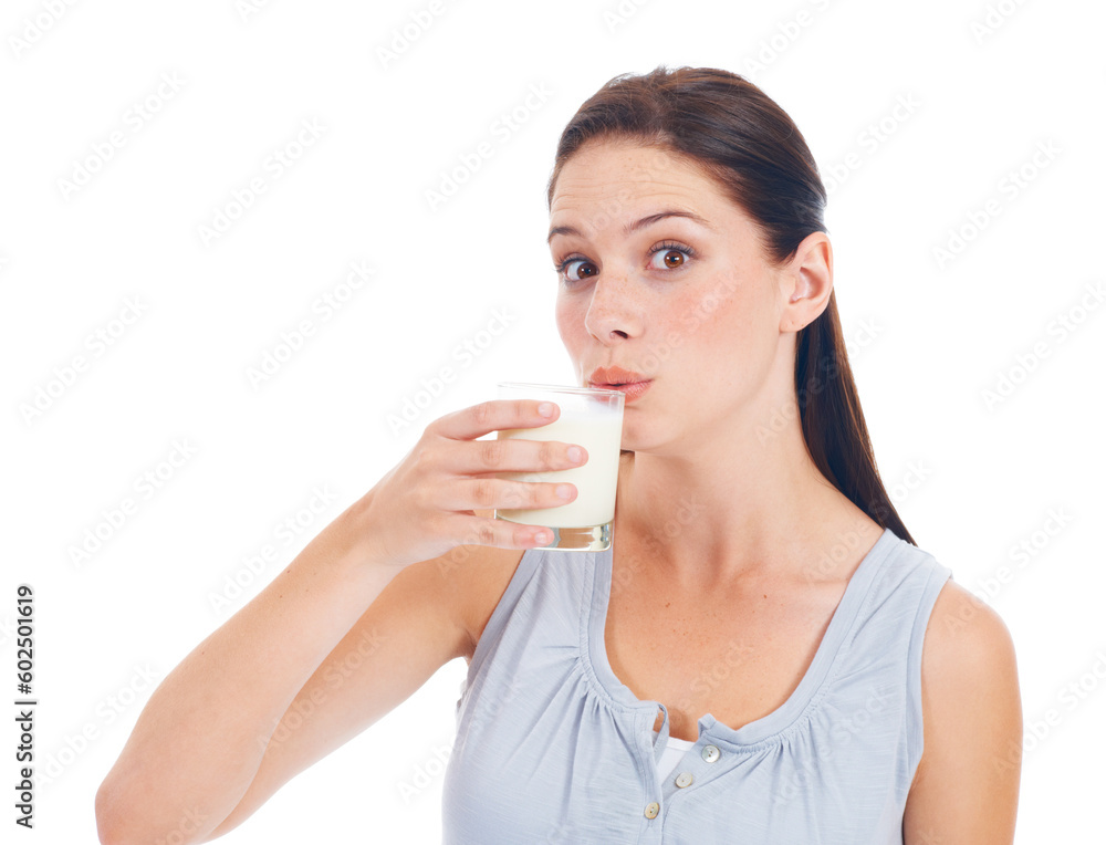 Drink up. Portrait, studio and woman drinks glass of milk for healthcare benefits, bone health or wellness hydration. Calcium dairy product, nutritionist face and model isolated on white background. Drink up. Portrait, studio and woman drinks glass of milk for healthcare benefits, bone health or wellness hydration. Calcium dairy product, nutritionist face and model isolated on white background.