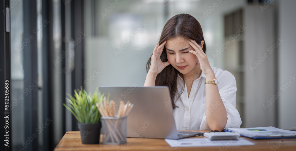 Portrait of tired young business Asian woman work with documents tax laptop computer in office. Sad, unhappy, Worried, Depression, or employee life stress concept
Portrait of tired young business Asian woman work with documents tax laptop computer in office. Sad, unhappy, Worried, Depression, or employee life stress concept