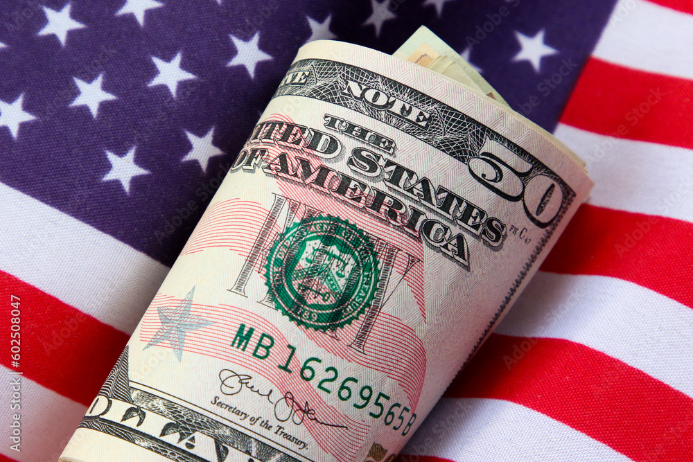 Fototapeta premium American dollars and American flag