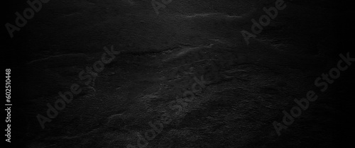 Natural black slate stone background pattern with high resolution. Top view, copy space.
