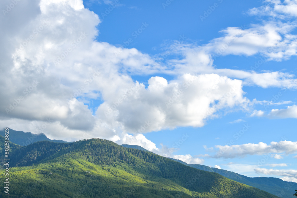 cloud over the pristine mountain in Bhutan