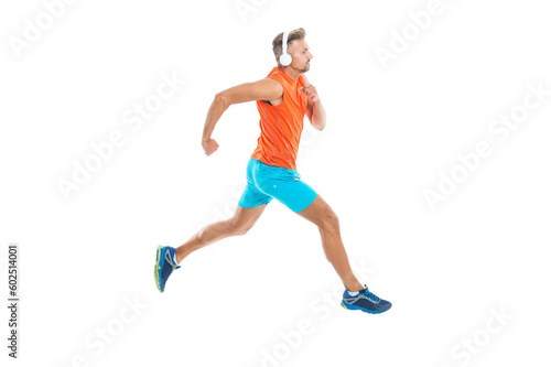 runner sprinted with incredible speed in headphones. sport competition. runner at long sport run. runner run isolated on white studio. sport runner crossed the finish line after completing a marathon © be free