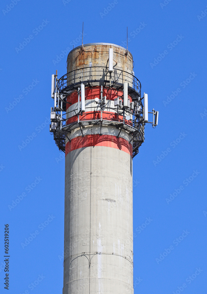 Smoke stack of the power station with antennas