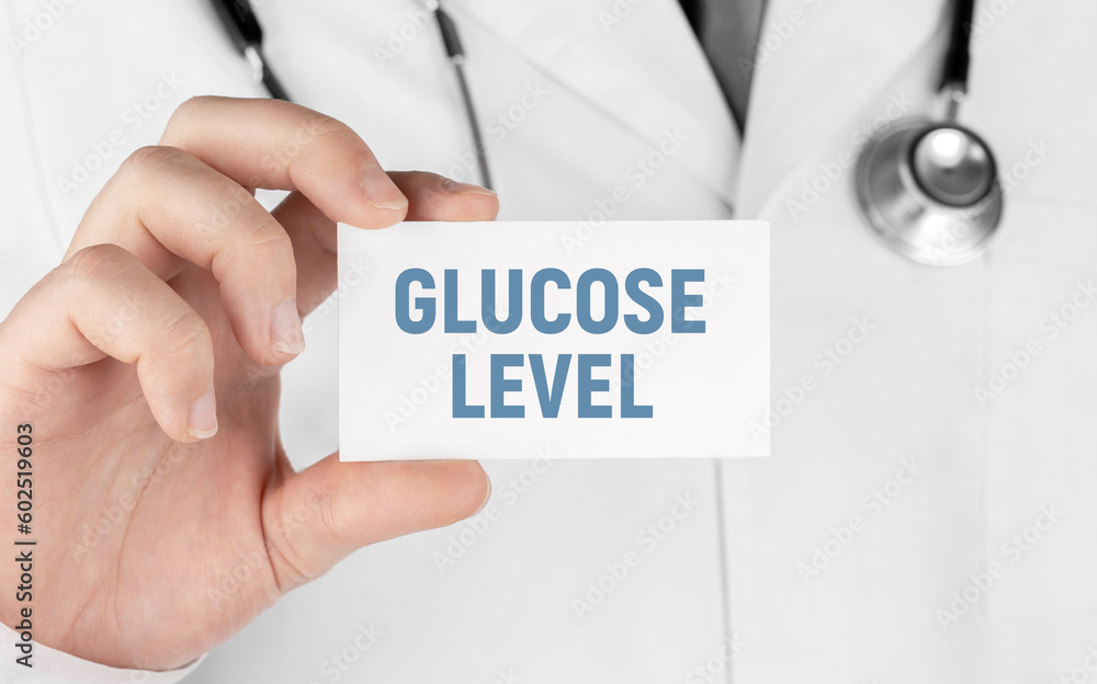 Doctor holding a card with word Glucose Level, Medical concept Doctor holding a card with word Glucose Level, Medical concept