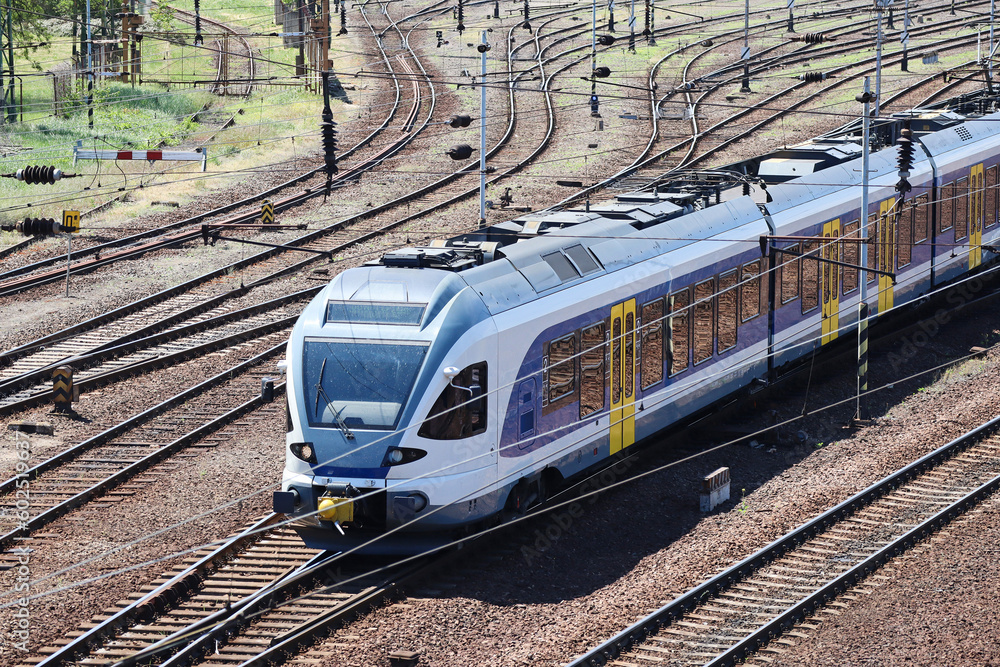 Passenger train on the railway track Passenger train on the railway track