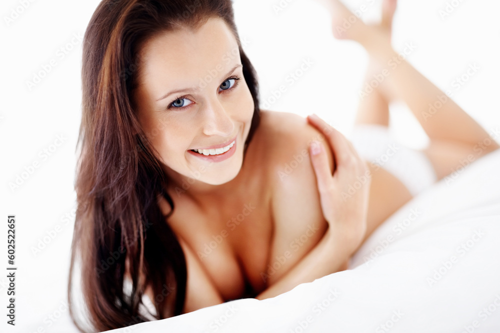 Sexy, topless and portrait of woman in bedroom for lingerie, fashion and beauty. Relax, smile and nude with happy female lying on bed in underwear for confidence, elegant and flirting at home Sexy, topless and portrait of woman in bedroom for lingerie, fashion and beauty. Relax, smile and nude with happy female lying on bed in underwear for confidence, elegant and flirting at home