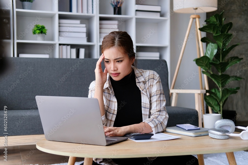 Depressed business woman facing some problems with her work Depressed business woman facing some problems with her work