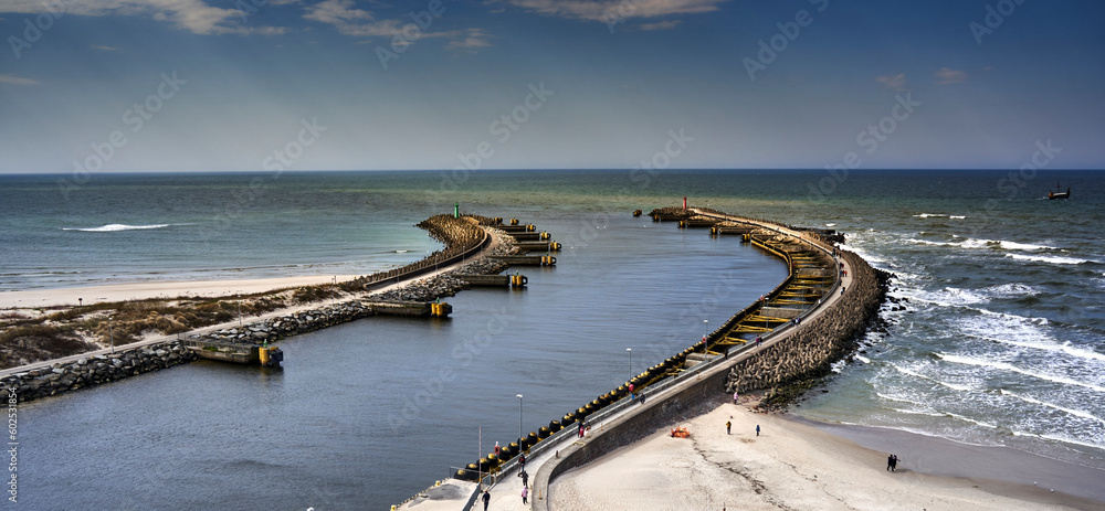 Fototapeta premium Port entrance from two moles at the Polish port of Kołobrzeg on the Baltic Sea