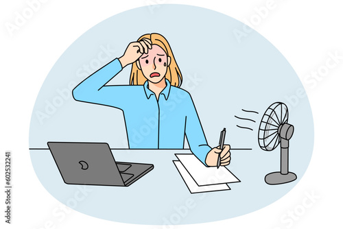 Tired woman work under ventilator in office