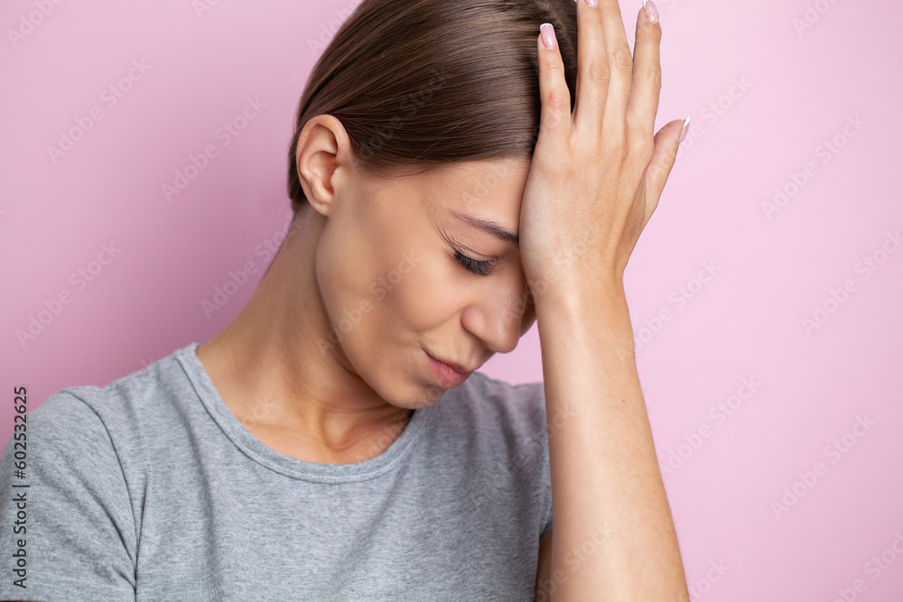 Feeling strong headache massaging temples exhausted from overwork, fatigued overwhelmed lady. Feeling strong headache massaging temples exhausted from overwork, fatigued overwhelmed lady.
