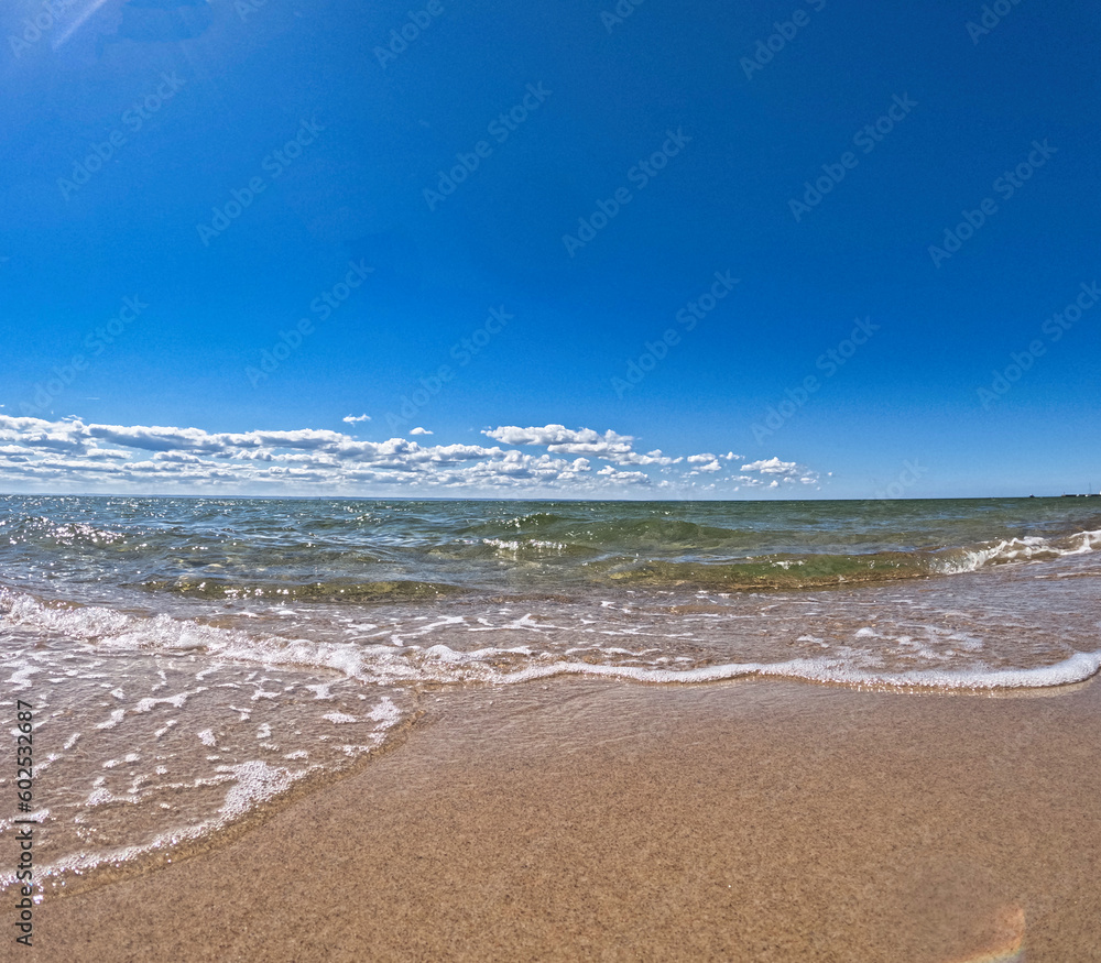 Waves on the beach. Sand on the beach. 