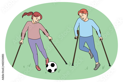 Happy children with physical disabilities playing football
