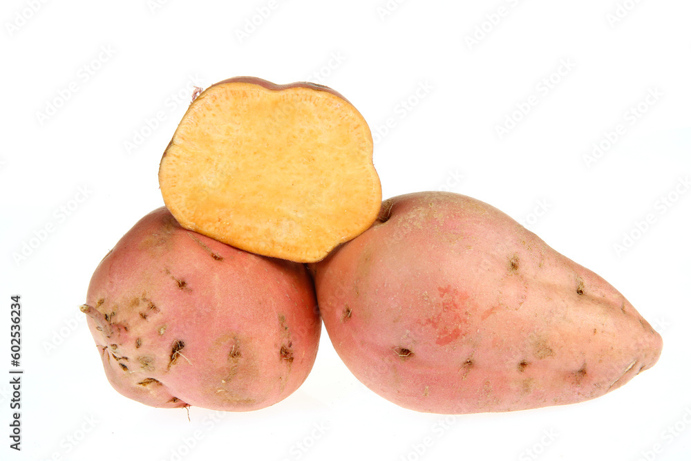 Ripe sweet potatoes on a white background Ripe sweet potatoes on a white background