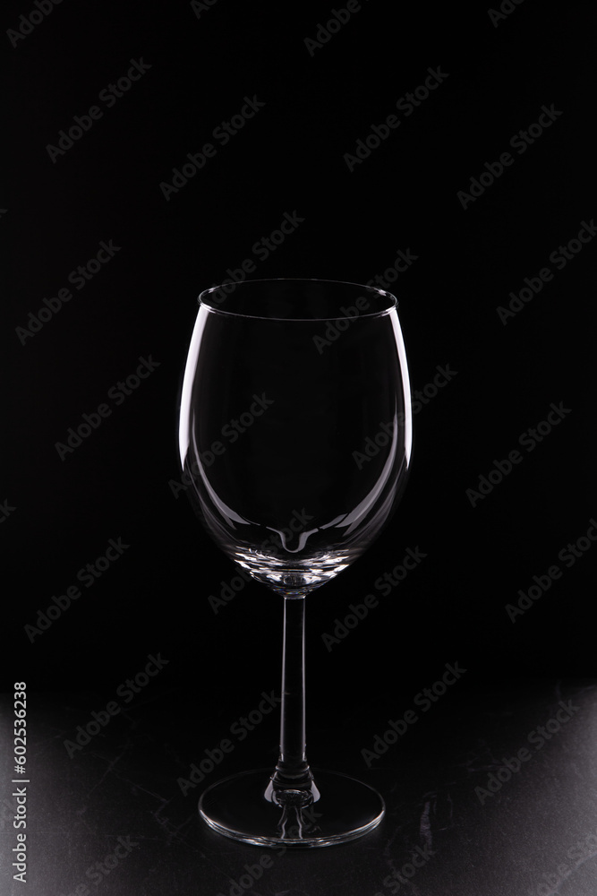 photo of an empty glass on a black background