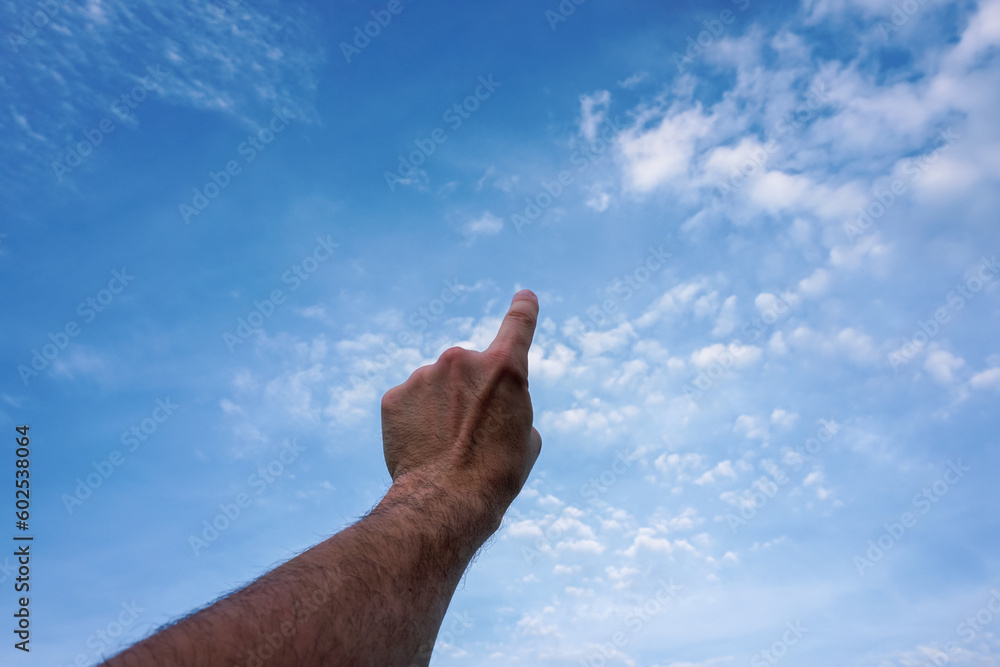 hand up gesturing in the blue sky, feelings and emotions hand up gesturing in the blue sky, feelings and emotions