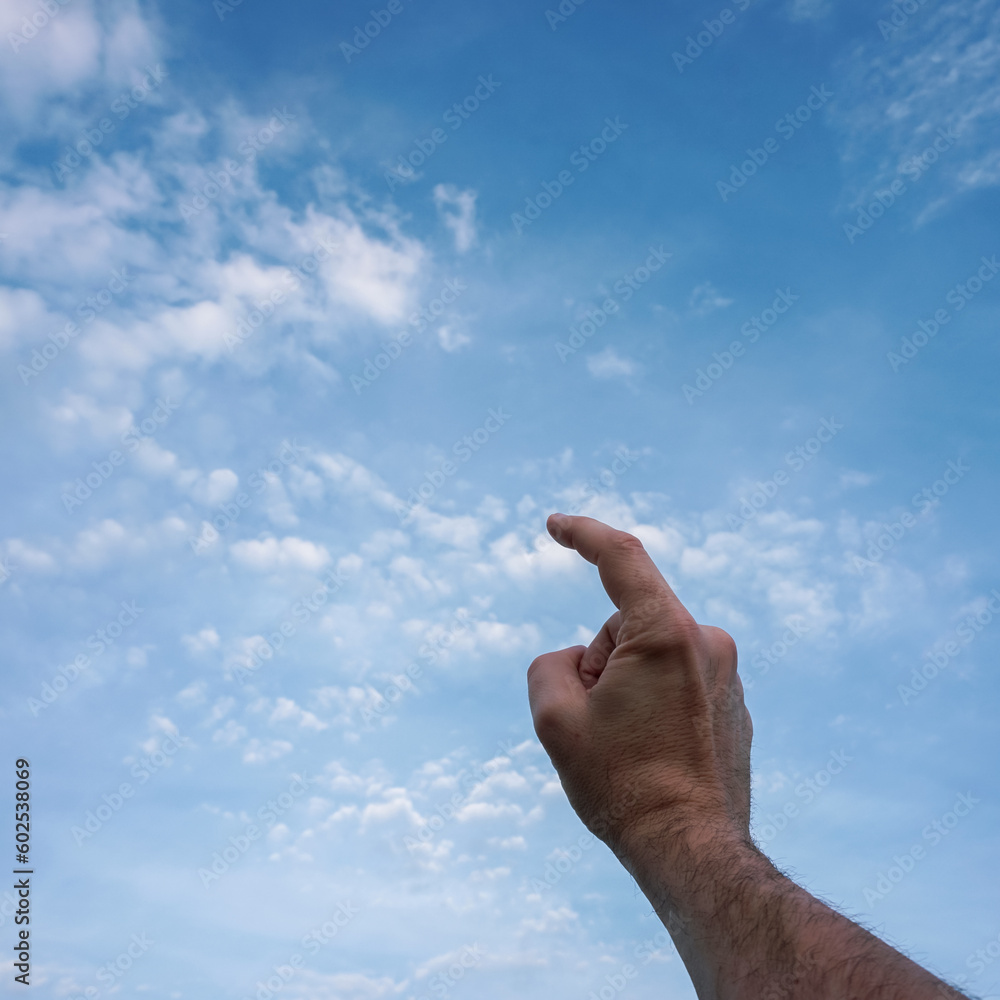 hand up gesturing in the blue sky, feelings and emotions hand up gesturing in the blue sky, feelings and emotions