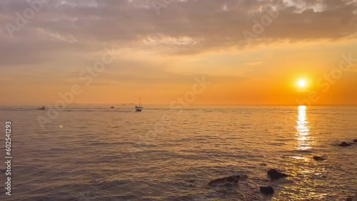Red sunset by the sea and boats floating in the sea. Istanbul Kalamis Park. Sunset and islands in istanbul. Sea ​​and boats at sunset. sunset views. peaceful landscape shooting. 4K and color. photo