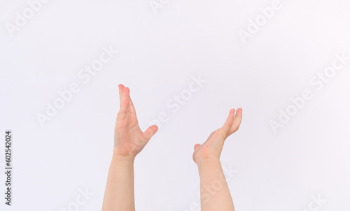 Two little hands are raised up