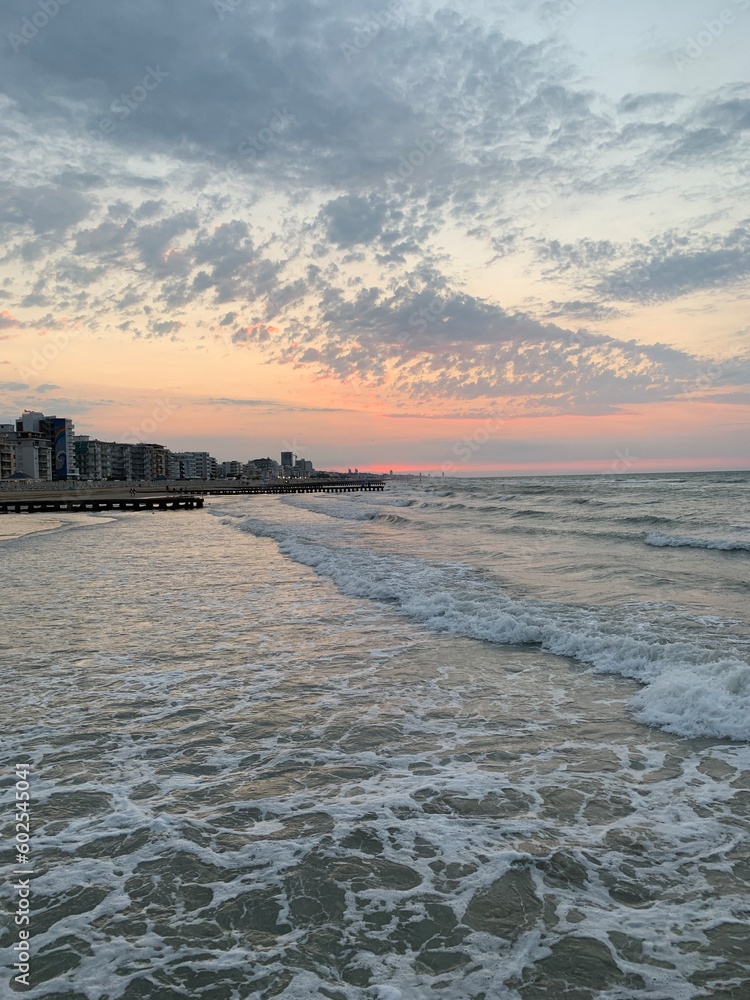 Fototapeta premium A new day lights up in the clouds
