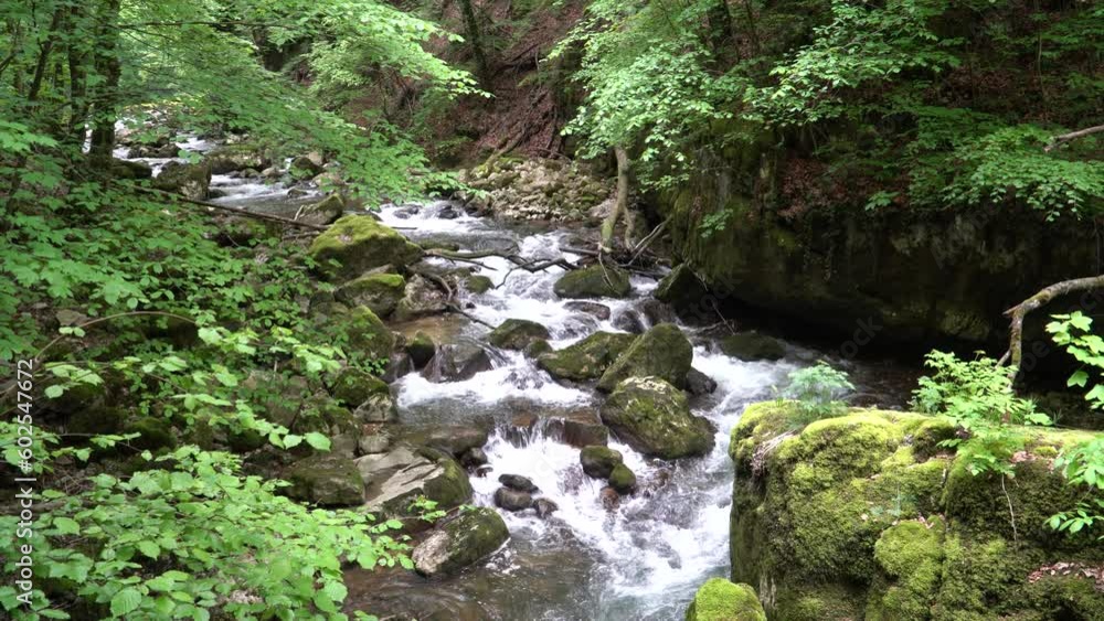 small river with waterfall in Biel, Switzerland small river with waterfall in Biel, Switzerland