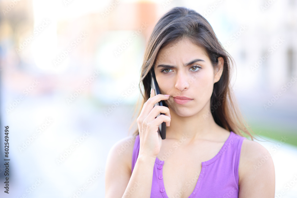 Suspicious woman attending phone call Suspicious woman attending phone call