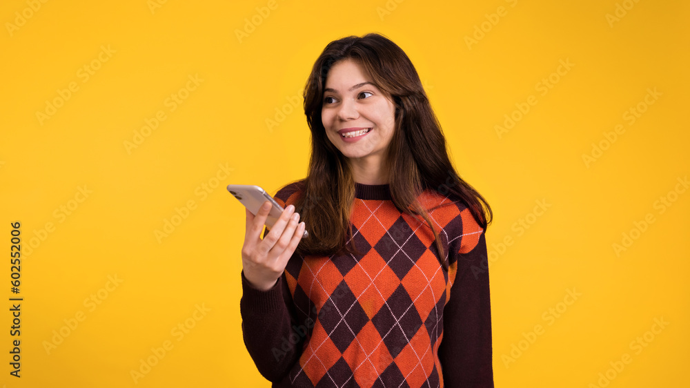 Young smiling woman talking on the phone Young smiling woman talking on the phone