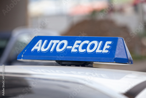Blue French driving school sign
