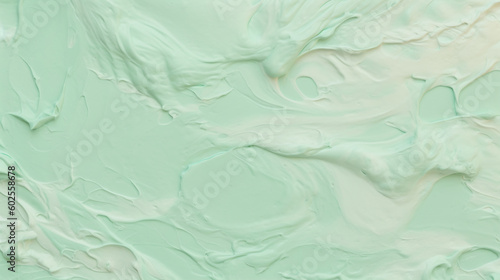 cream texture in pastel green and turkis colors, top view