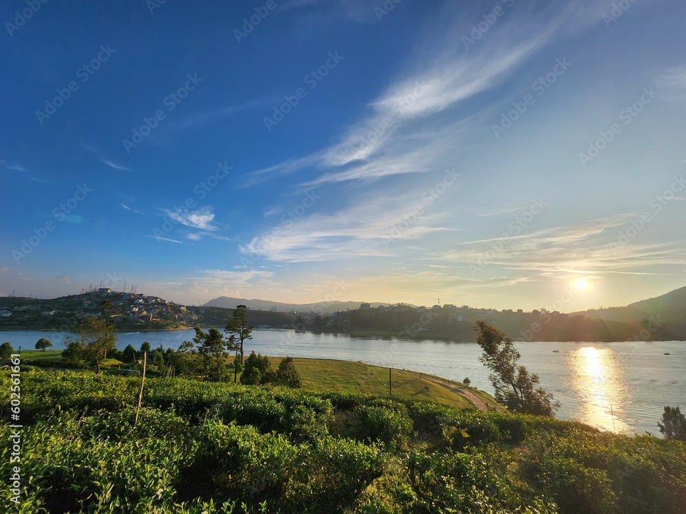 Obraz premium sunset over the river
