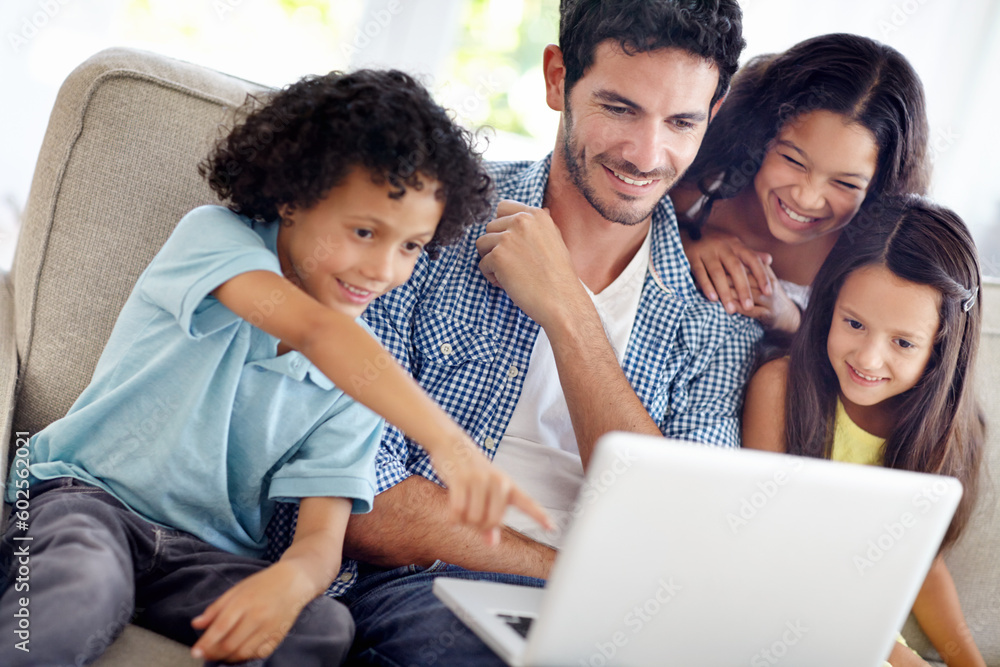 © N Katie/peopleimages.com - Laptop, watch and happy family father, children or people point at online shopping choice, social media video or meme. Happiness, love and group of kids with dad streaming movie in home living room
